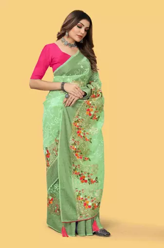 Green organza embroidered zari woven heavy look ethnic saree with blouse