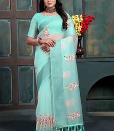 Teal organza embroidered zari woven heavy look ethnic saree with blouse