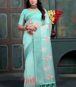 Teal organza embroidered zari woven heavy look ethnic saree with blouse