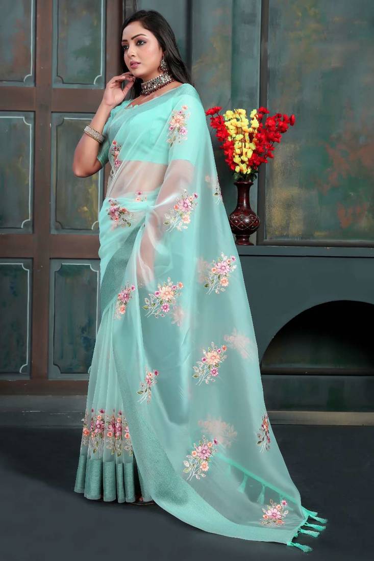 Teal organza embroidered zari woven heavy look ethnic saree with blouse