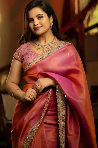 Pink tissue embroidered zari work heavy look ethnic saree with blouse