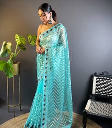Teal net embroidered thread work heavy look ethnic saree with blouse