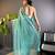 Teal net embroidered thread work heavy look ethnic saree with blouse
