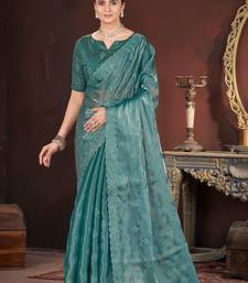 Green silk embroidered sequins work heavy look ethnic saree with blouse