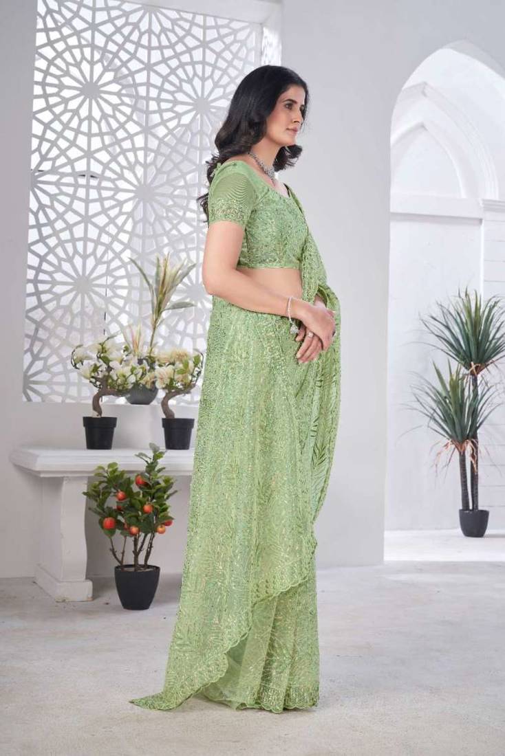 Green net embroidered thread work heavy look ethnic saree with blouse