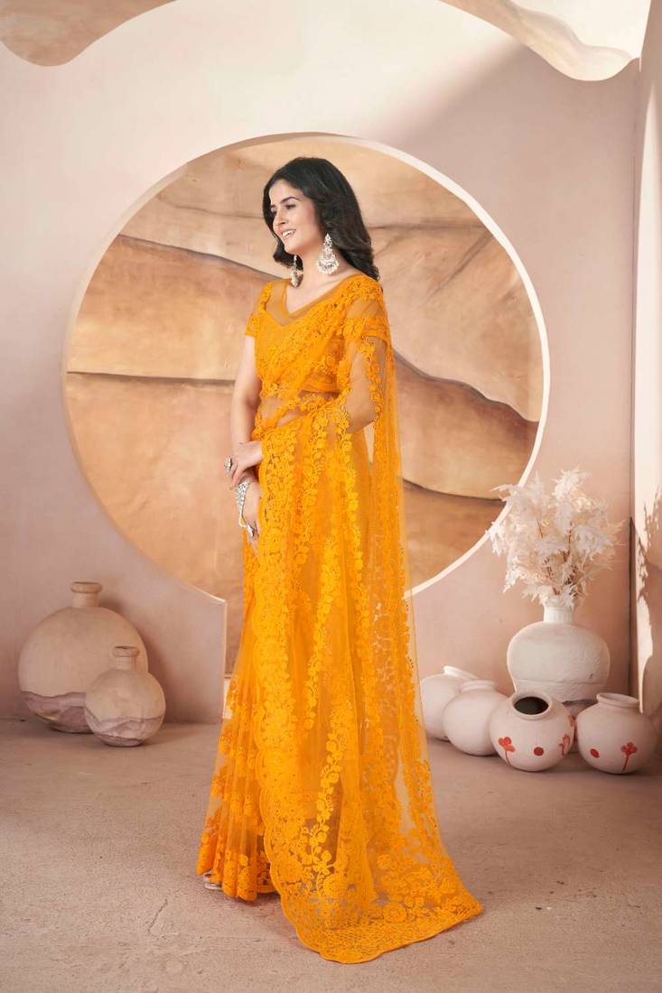 Yellow net embroidered aari work heavy look ethnic saree with blouse