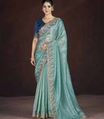 Teal georgette embroidered sequins work heavy look ethnic saree with blouse