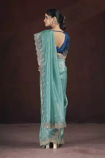 Teal georgette embroidered sequins work heavy look ethnic saree with blouse