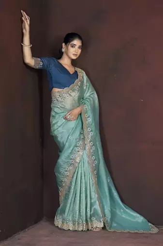 Teal georgette embroidered sequins work heavy look ethnic saree with blouse