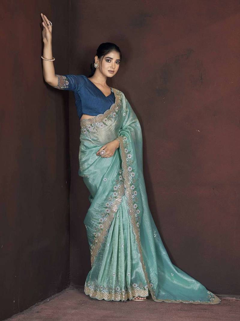 Teal georgette embroidered sequins work heavy look ethnic saree with blouse