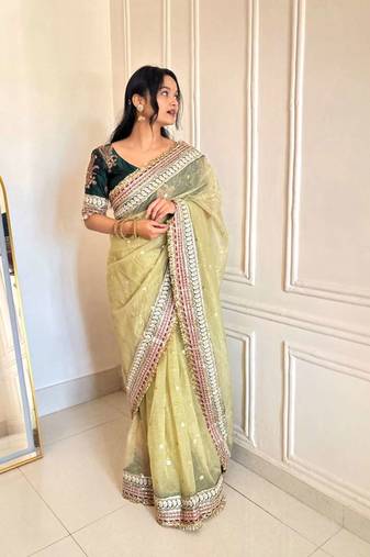 Green banarasi silk embroidered sequins work heavy look ethnic saree with blouse