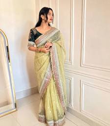 Green banarasi silk embroidered sequins work heavy look ethnic saree with blouse