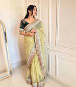Green banarasi silk embroidered sequins work heavy look ethnic saree with blouse