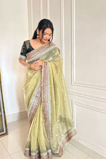Green banarasi silk embroidered sequins work heavy look ethnic saree with blouse