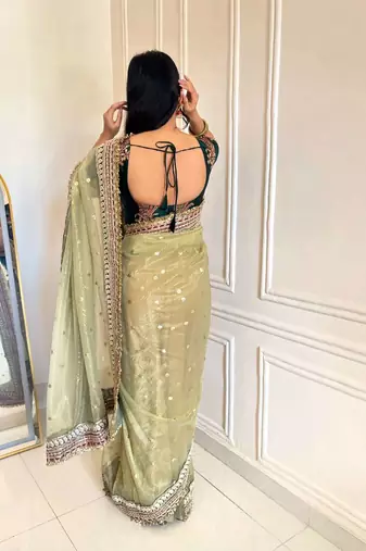 Green banarasi silk embroidered sequins work heavy look ethnic saree with blouse