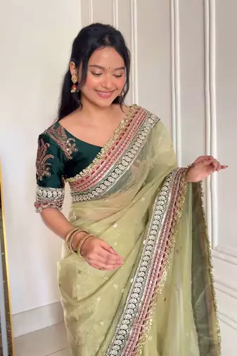 Green banarasi silk embroidered sequins work heavy look ethnic saree with blouse