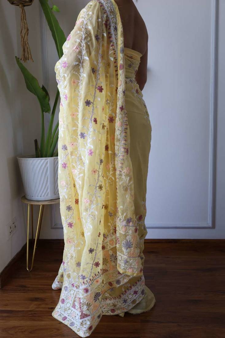 Yellow net embroidered aari work heavy look ethnic saree with blouse