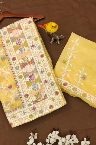 Yellow net embroidered aari work heavy look ethnic saree with blouse