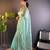 Sea green net embroidered thread work heavy look ethnic saree with blouse