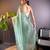 Sea green net embroidered thread work heavy look ethnic saree with blouse