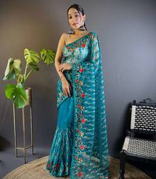 Teal net embroidered thread work heavy look ethnic saree with blouse