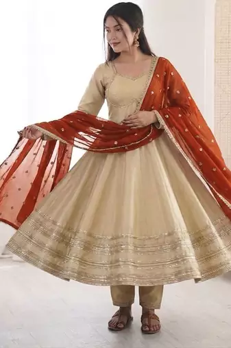 Beige heavy lace work cosmos gold anarkali suit set