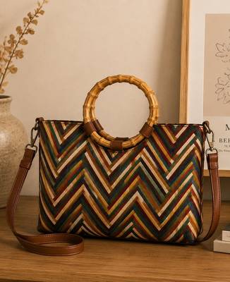  lines & loops tan jacquard chevron handheld bag 1