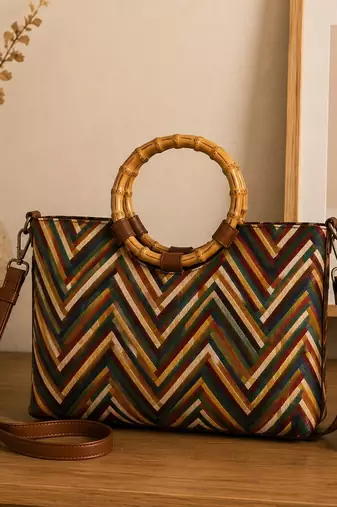  lines & loops tan jacquard chevron handheld bag