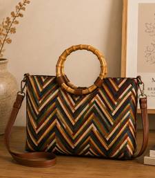  lines & loops tan jacquard chevron handheld bag