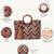  lines & loops tan jacquard chevron handheld bag
