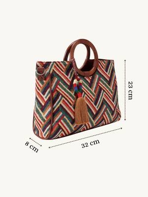  lines & loops tan jacquard chevron handheld bag 4