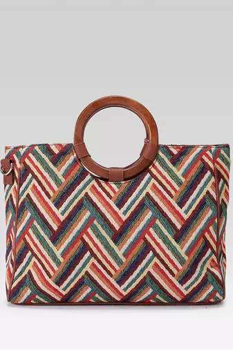 lines & loops tan jacquard chevron handheld bag