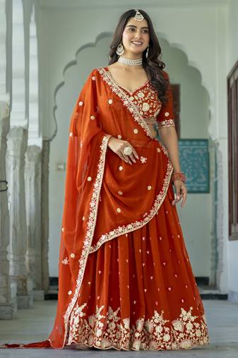 Rust embroidered Party Wear Lehenga Choli 
