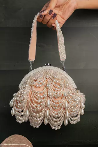 Pink pearl beaded suede clutch