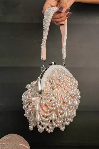 Pink pearl beaded suede clutch