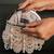 Pink pearl beaded suede clutch