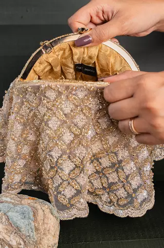 Gold beige thread embroidered silk clutch
