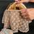 Gold beige thread embroidered silk clutch