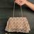 Gold embroidered silk handbag
