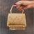 Gold beaded silk tassel handbag