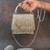 Ivory silver beaded silk handbag