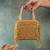 Gold weave fringe silk handbag