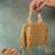 Gold weave fringe silk handbag
