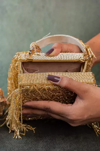 Gold weave fringe silk handbag