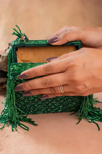 Emerald green weave fringe silk handbag