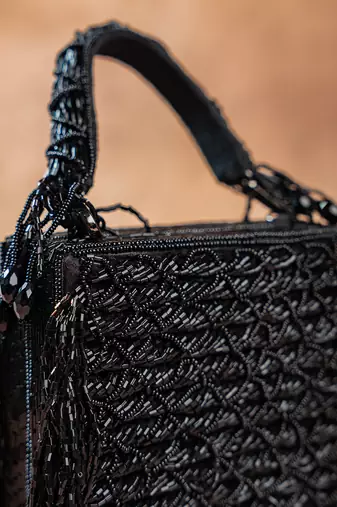 Jet black weave fringe silk handbag