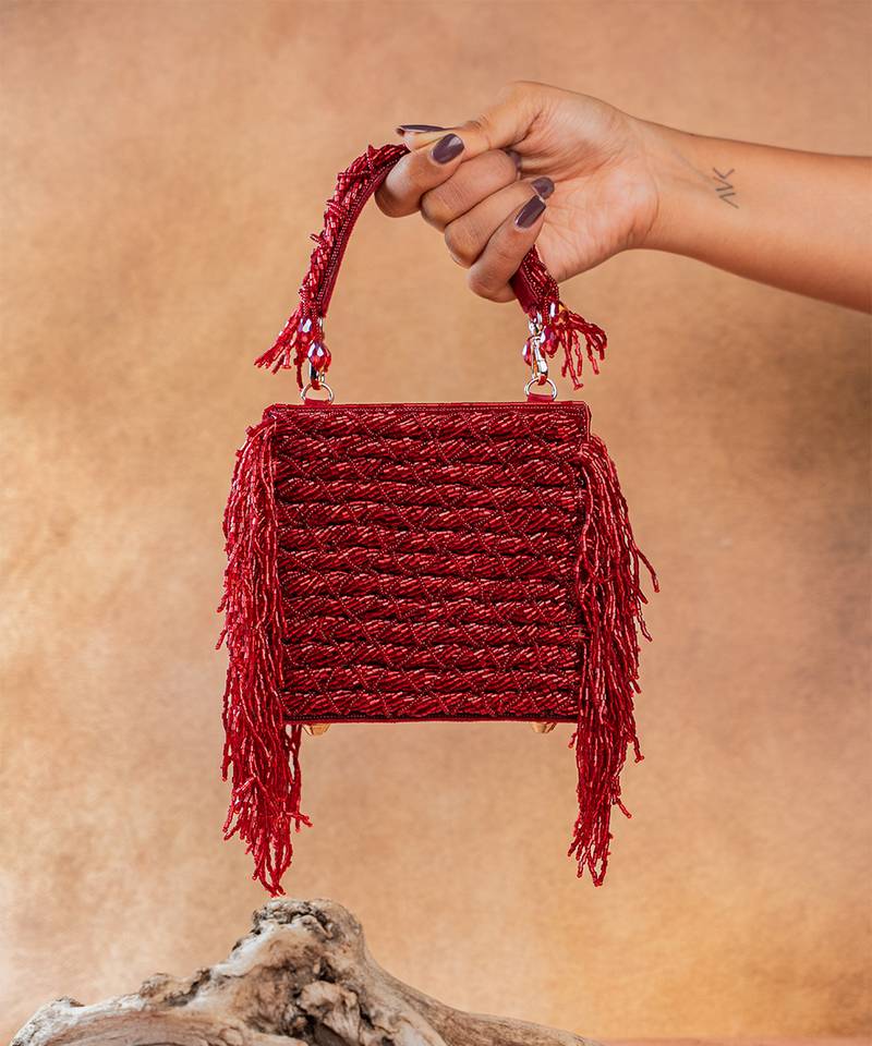 Ruby red weave fringe silk handbag