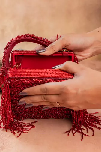 Ruby red weave fringe silk handbag