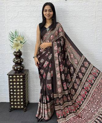 dark brown color mirror work border with handcrafted red tassels (latkan) and ajarakh print gajji silk blend saree 1