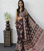 dark brown color mirror work border with handcrafted red tassels (latkan) and ajarakh print gajji silk blend saree
